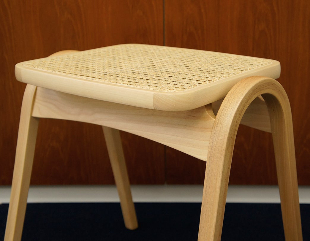Rattan model of stacking bentwood stool designed by Isamu Kenmochi commemorating the 60th anniversary