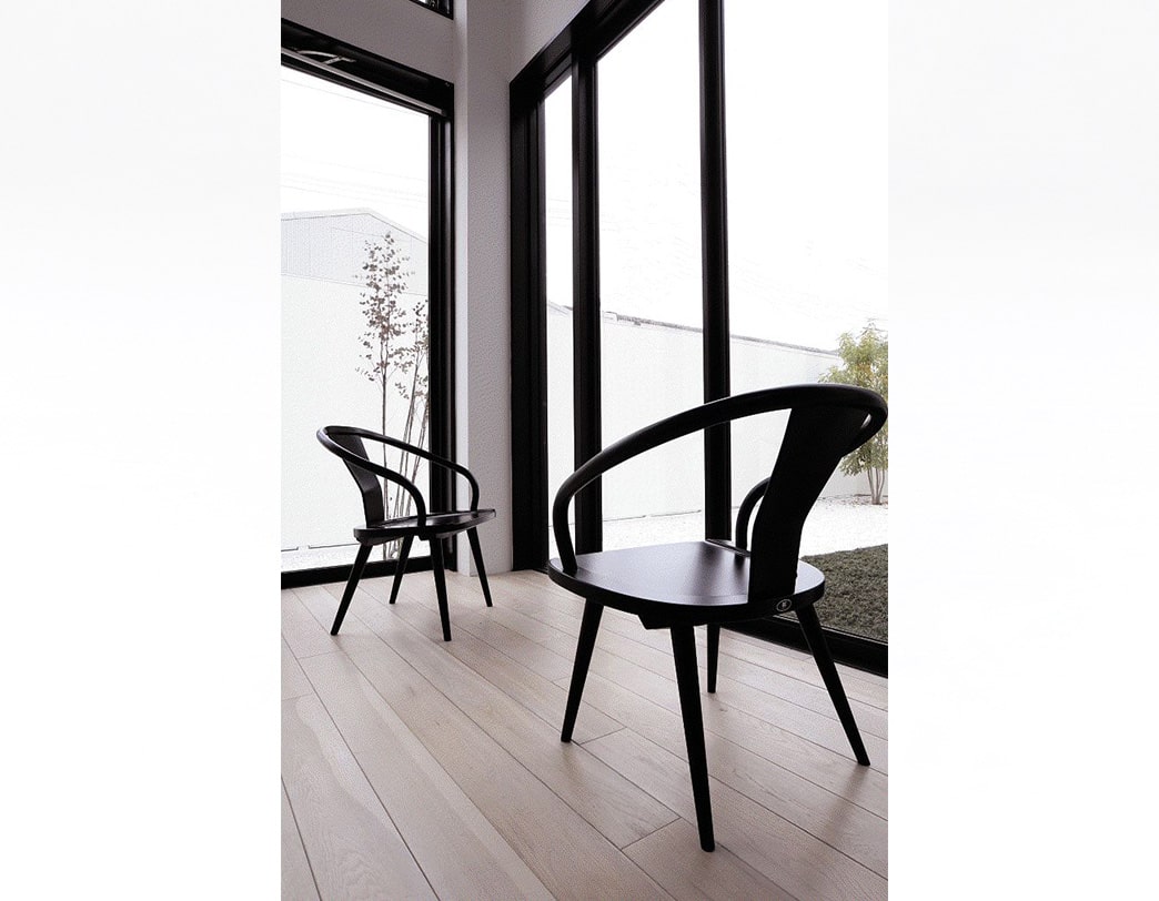 Isamu Kenmochi's modernized Ming-style dining chair with curved bentwood design, awarded the 1964 Good Design Award