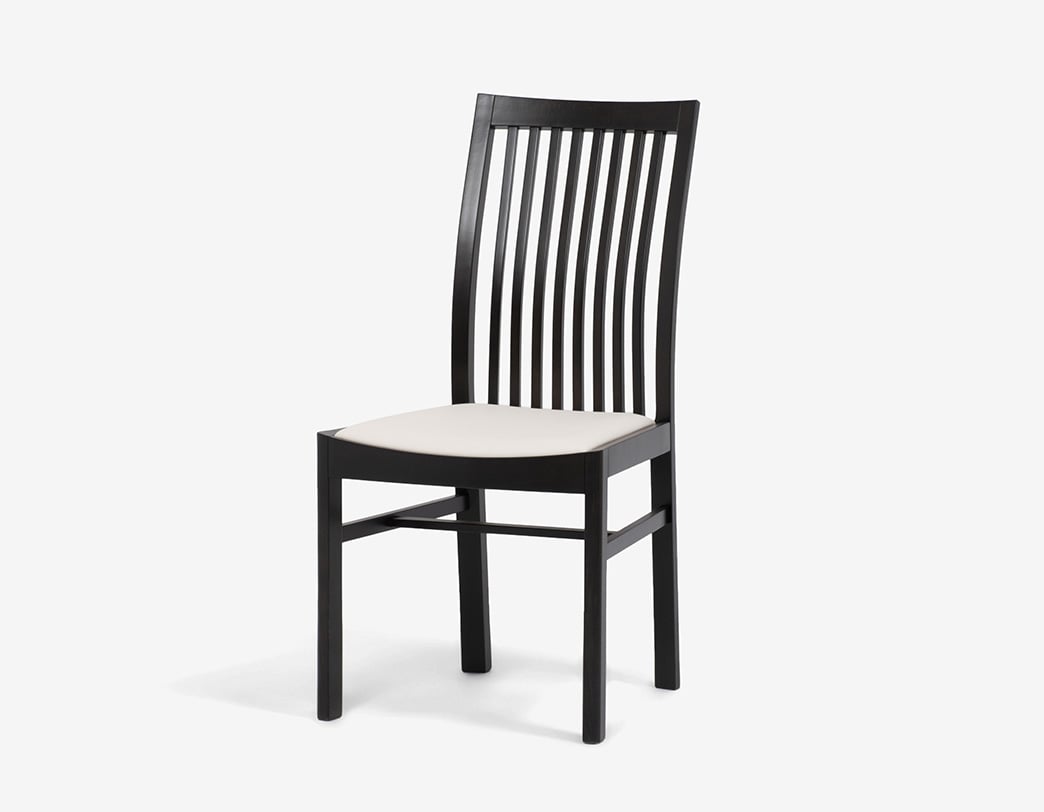 Modern dining chair with impressive curves designed by Isamu Kenmochi