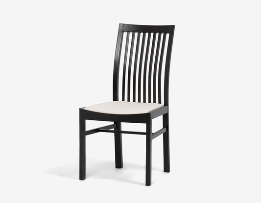 Modern dining chair with impressive curves designed by Isamu Kenmochi