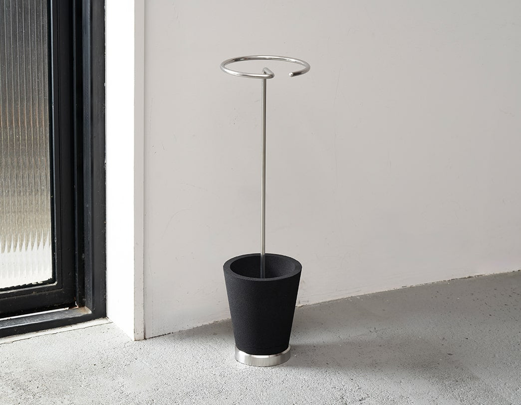 Sustainable umbrella stand made of stainless steel and recycled resin