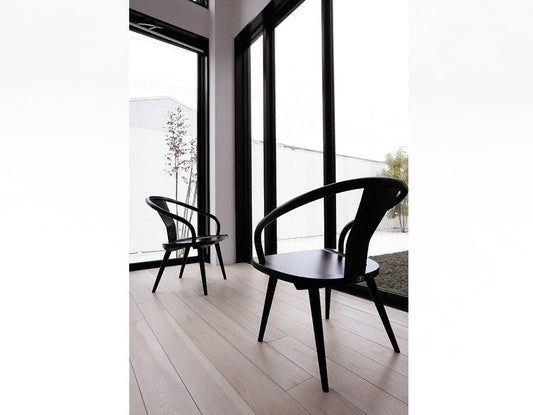 Isamu Kenmochi's modernized Ming-style dining chair with curved bentwood design, awarded the 1964 Good Design Award