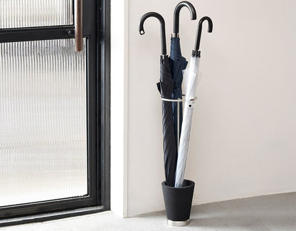 Sustainable umbrella stand made of stainless steel and recycled resin